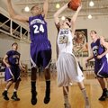 Bentonville’s Tyler Sanderlin takes the ball to the basket under pressure from Fayetteville’s Taylor...
