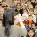 Bentonville High School sophomore Dani Phillips plays “Beautiful Dreamer” for students Friday at App...