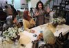 Jenan Mubarak (right), a candidate with the Iraq Unity Alliance, speaks at an event Friday in Baghdad. Iraq is to hold parliamentary elections on March 7.