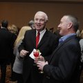 SPRINGDALE COMMERCE - Dwain Newman, left, chairman of National Home Center, talks with Knight Weis w...