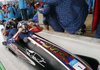  The United States' USA-1, with Steven Holcomb, front, Justin Olsen, Steve Mesler, and Curtis Tomasevicz, celebrate their gold medal finish during the men's four-man bobsled final competition at the Vancouver 2010 Olympics in Whistler, British Columbia, Saturday, Feb. 27, 2010.