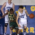 Fayetteville Woodland’s Caleb Waitsman dribbles the ball past Alma’s Corey Whitney during their cham...