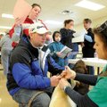 SPAY DAY - Justin Hayes of Goshen talks Saturday with veterinarian Romy Core of Gulley Park Pets Cli...