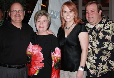 
                               
                                  Photo by Carin Schoppmeyer&mdash;
                               
                           
                           Philip and Beach Ball Chairwoman and Arts Center of the Ozarks board member Mary Ann Taldo, from left, visit with board member Melonie and Brian Moore at the Feb. 20 fundraiser.