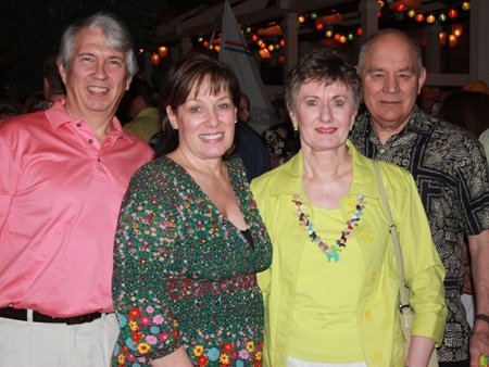 
                               
                                  Photo by Carin Schoppmeyer&mdash;
                               
                           
                           Rick Couvillion and Teri Stafford, from left, Joyce Stafford and Jack Cole enjoy the Arts Center of the Ozarks Beach Ball.