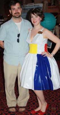 
                               
                                  Photo by Carin Schoppmeyer&mdash;
                               
                           
                           Jennifer Simmons, with husband John Simmons, models her dress at the Arts Center of the Ozarks Beach Ball. The dress is made from a beach ball.