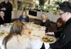 Susan Beard, right, executive chef for the Holiday Inn and Convention Center in Springdale, shows the dishes a group from the Holiday Inn and Junior Auxiliary will taste test. The group includes from second right, Aleta Travis, director of catering; Lisa Will, public relations chairwoman for Junior Auxilary of Washington County; Jacque Adams, president; Sarah Griggs, provisional member; and Amanda Miller, treasurer. The group was helping to decide the meal to be served at the third annual “Are you Smarter Than A Hog?” trivia benefit to occur Saturday at the Holiday Inn in Springdale.