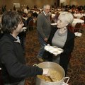  Case DiGhero (left), owner of Soul Restaurant and Lounge in Fayetteville, talks with Connie Cramer ...