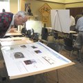 STAFF PHOTO J.S. WEDGEWORTH 
Maurice Rankin of Fayetteville looks over information about sustainabl...