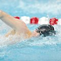 STAFF PHOTO ANDY SHUPE 
Springdale sophomore Dexter Thomas competes in the 200-yard freestyle durin...