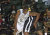    Alma's Isaac McCoy tries to get past Wilber Mills University Studies defender Chris Dobbins during the first half of Tuesday afternoons 2010 5A State Boys basketball tournament at Alma High School in Alma.