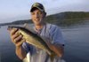 STAFF PHOTO FLIP PUTTHOFF 
Late winter brings prime walleye fishing. Don Grose, a Beaver Lake walleye guide from Rogers, shows a walleye he caught from the lake in 2007.