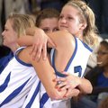 STAFF PHOTO MARC F. HENNING 
Rogers High seniors Morgan Hook, left, and Jazmin Coultas embrace duri...