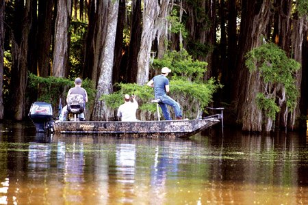 young-bass-anglers-cast-lures-while-probing-the-waters-of-lake-enterprise-an-agfc-maintained-oxbow-lake-off-bayou-bartholomew-in-extreme-southern-arkansas-while-many-arkansas-game-and-fish-commission-lakes-offer-prime-fishing-for-boaters-several-also-incorporate-areas-managed-specifically-for-bank-fishermen