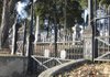 An ornate gate, above, marks an entrance to Van Buren’s historic Fairview Cemetery. In “Silent Storytellers,” premiering next week on AETN, graveyarder Abby Burnett discusses the folk art and burial practices of the Northwest Arkansas Ozarks. Closer observation of Mary Ollie Whitlow’s grave, left, in the Wesley Cemetery revealed a hidden compartment concealing her photograph. It was the perfect moment for a graveyarder like Burnett.