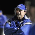 Rogers High football coach Ronnie Peacock watches his offense on Oct. 30 in Rogers against Fort Smit...