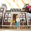 PLAYHOUSE PLAY - Yancy Anderson, right, and his 4-year-old daughter, Bella, discuss their next stop ...