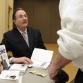 SENIOR HEALTH - Dr. David Lipschitz signs a copy of his book “Dr. David’s First Health Book of More ...