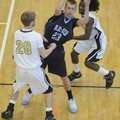 Springdale’s Har-Ber’s Tyler Booth looks for help while Little Rock Central’s Matt Johnson, left, an...
