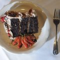 Sisters Gourmet Bistro serves some 30 kinds of cake, including this one with strawberries. Most days...