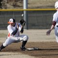 Rogers Heritage’s Reed Brown can’t hang on to the ball as Siloam Springs’ Zach Houston steals second...