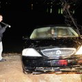 SUBMERGED SEDAN - Lt. Brian Comstock of the Washington County Sheriff’s Office checks the interior o...