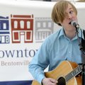 Jonathan Ramsey of St. Louis performs Irish folk music Friday during Downtown Bentonville’s First Fr...