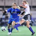 Fayetteville junior Anne Mitchell, right, takes a shot on goal as Bryant junior Sarenity Gomez defen...