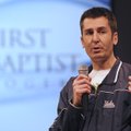 Dr. Adam Maass speaks Sunday to the congregation of First Baptist Church in Rogers about his experie...