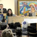 PURIM CELEBRATION - Rabbi Jack Zanerhaft and his wife, Cantor Debbye Zanerhaft, read from the bimah ...