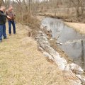 Springdale Mayor Doug Sprouse, left, and Sam Goade, director of Springdale Public Works, inspect a p...