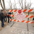 Springdale Mayor Doug Sprouse, left, and Sam Goade, director of Springdale Public Works, watch Monda...