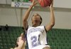 Fayetteville’s Sydney Conley scores in front of Bryant’s Brooke Parish in the third quarter of the Lady Bulldogs’ 73-45 victory in the Class 7A state tournament Saturday in Van Buren.
