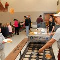 FLYING FLAPJACK - Apple Glen Elementary School third-grader Brad Chu keeps his eye on the pancake Sa...