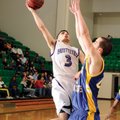 Fayetteville guard Kikko Haydar, left, shoots over North Little Rock’s Mike Evans in the second half...