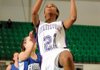 Fayetteville forward Sydney Conley goes for a layup in front of Bryant’s Brooke Parish in the second half of Fayetteville’s 73-45 win Saturday during the Class 7A State Tournament in Clair Bates Arena in Van Buren.