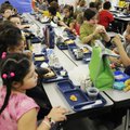 Students at Washington Elementary School eat lunch Friday in Fayetteville.