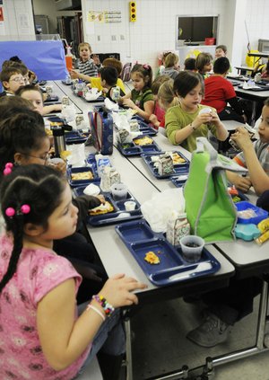 Students at Washington Elementary School eat lunch Friday in Fayetteville.
