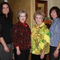 Fayetteville Public Education Foundation Board member Lisa Devine, from left, visits with donors Ali...