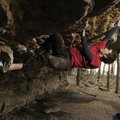 Cole Fennel demonstrates bouldering at a site in Northwest Arkansas on Feb. 19. The 24-year-old wrot...
