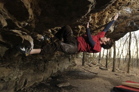 
                               
                                  Photo by Anthony Reyes&mdash;
                               
                           
                           Cole Fennel demonstrates bouldering at a site in Northwest Arkansas on Feb. 19. The 24-year-old wrote a 400-page guidebook cataloging many rock climbing sites in the state.