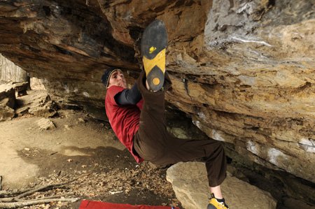 
                               
                                  Photo by Anthony Reyes&mdash;
                               
                           
                           Fennel demonstrates bouldering, a type of low rock climbing that doesn’t use ropes. Fennel authored a guidebook, “Rock Climbing Arkansas: Comprehensive Roped Climbing and Select Bouldering,” that was published in the fall.