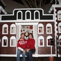 John and Brandy Overton, with their daughter Sofia Overton, show the Old Main playhouse they built a...