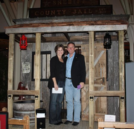 
                               
                                  Photo by Carin Schoppmeyer&mdash;
                               
                           
                           Holly and Washington County Sheriff Tim Helder stand on the porch of the “Sheriff’s Office” playhouse donated by the Washington County Sheriff’s Office.