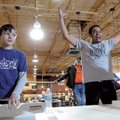 SWEET VICTORY - John Stay, right, of Fayetteville celebrates Saturday after eating seven doughnuts i...