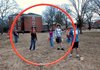 Ed Crews (puffy hair and black headband), co-organizer of the Hendrix Quidditchers, bears down upon the Keeper of the Team Orange Headbands hoop, Dmitriy Nurullayev, as orange headbanders saunter menacingly nearby.