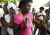 Haitians wait in line for medical treatment at a clinic in Bois Marchand near Gonaives organized by the Arkansas group Haitian Christian Development Project.