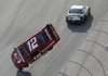  Brad Keselowski (12) flips after being nudged by Carl Edwards, top, during the NASCAR Sprint Cup Series Kobalt Tools 500 auto race at Atlanta Motor Speedway in Hampton, Ga., Sunday