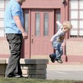 STAFF PHOTO DAVID FRANK DEMPSEY 
Benjamin Allee, 3, makes a long jump Sunday while walking with his...