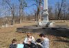 STAFF PHOTOS ANDY SHUPE 
Members of the newly formed band “Ukulelephobe,” from left, Rodney Wilhite, Erika Wilhite and Jacob Shores, rehearse Thursday alongside the Wilhites’ dog, Punkin, at the Confederate Cemetery in Fayetteville.